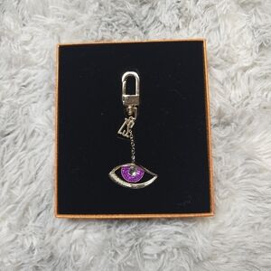 Taylor Swift Silver and Purple Eye Keychain